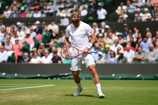 Liam Broady celebrates Wimbledon