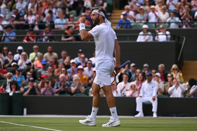 Liam Broady celebrates Wimbledon