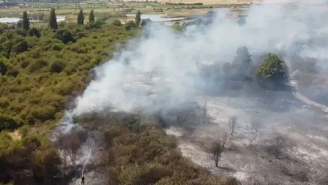 A fire at Dartford Marshes. Issue date: Tuesday July 19, 2022.