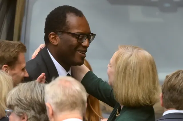 Liz Truss hugs colleague Kwasi Kwarteng, the business secretary, after hearing she'd made the final two in the Tory leadership race