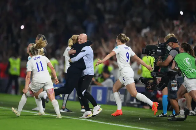 Sarina Wiegman celebrates with Arjan Veurink, Assistant Manager of England after their sides victory during the UEFA Women's Euro 2022 Quarter Final match between England and Spain at Brighton & Hove Community Stadium
