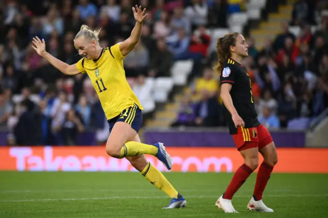 Stina Blackstenius celebrates scoring the opening goal during the UEFA Women's Euro 2022 quarter final football match between Sweden and Belgium at the Leigh Sports Village Stadium, in Leigh, on July 22, 2022.