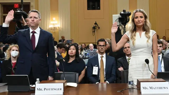 Matthew Pottinger and Sarah Matthews are sworn in