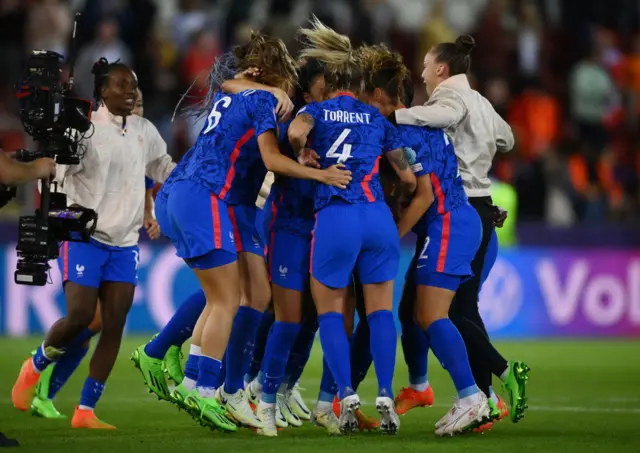 France's players celebrate their victory at the end of the UEFA Women's Euro 2022 quarter final football match between France and Netherlands at the New York Stadium, in Rotherham, on July 23, 2022.