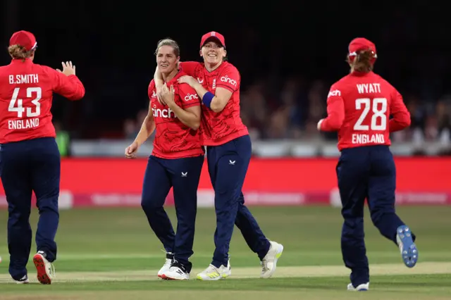 Katherine Brunt and Heather Knight celebrate a wicket in the first T20 against South Africa