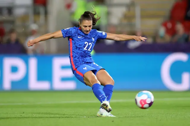 Eve Perisset of France scores their team's first goal from the penalty spot during the UEFA Women's Euro 2022 Quarter Final match between France and Netherlands at The New York Stadium on July 23, 2022 in Rotherham, England.