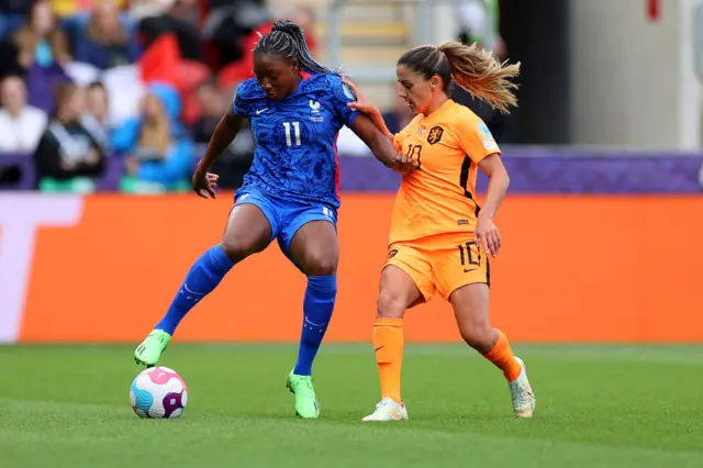 Kadidiatou Diani of France is challenged by Danielle van de Donk of The Netherlands during the UEFA Women's Euro 2022 Quarter Final match between France and Netherlands at The New York Stadium on July 23, 2022