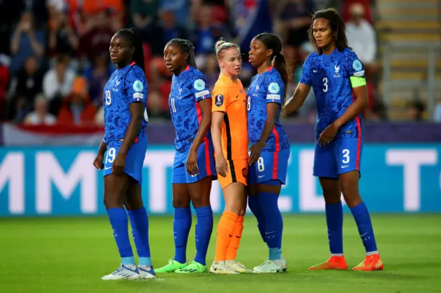 Jackie Groenen of The Netherlands looks on with Griedge Mbock Bathy, Kadidiatou Diani, Grace Geyoro and Wendie Renard of France during the UEFA Women's Euro 2022 Quarter Final match between France and Netherlands at The New York Stadium on July 23, 2022