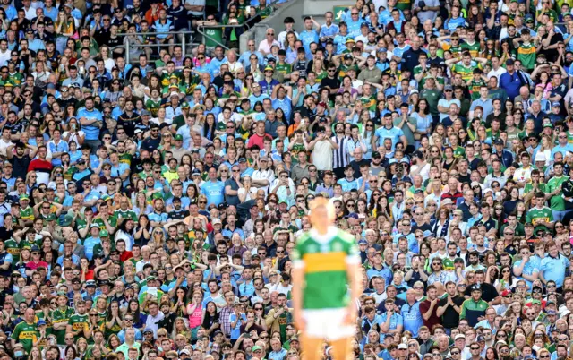 Fans look on before O'Shea's kick