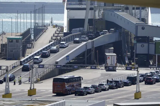 Cars board a ferry at the Port of Dover in Kent