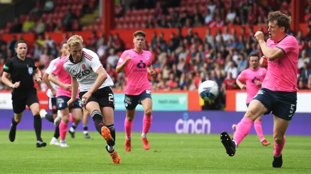 Ross McCrorie scores