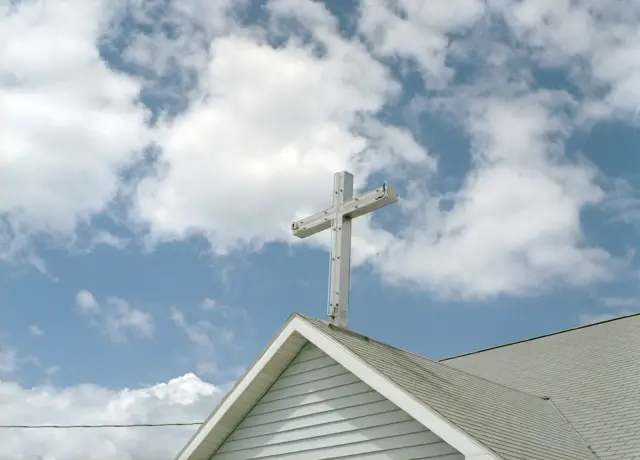 Stock image of church with cross