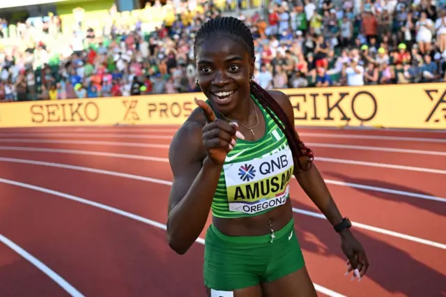 Nigeria's Tobi Amusan reacts after winning the women's 100m hurdles final during the World Athletics Championships at Hayward Field in Eugene, Oregon on July 24, 2022.