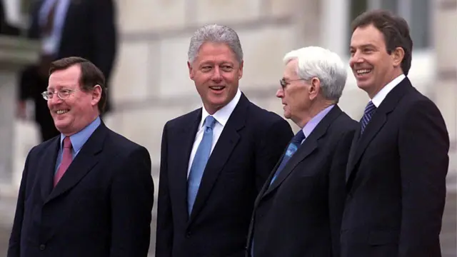 Lord Trimble, pictured in 2000 with former US President Bill Clinton, as well as Seamus Mallon and Tony Blairair