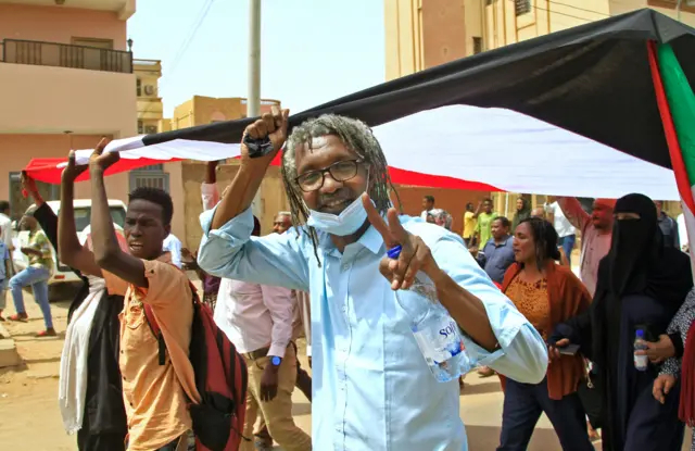 Sudan's Forces for Freedom and Change official Ismail al-Taj, takes part in an anti-coup demonstration in the Bashdar station area in southern Khartoum, on July 26, 2022.