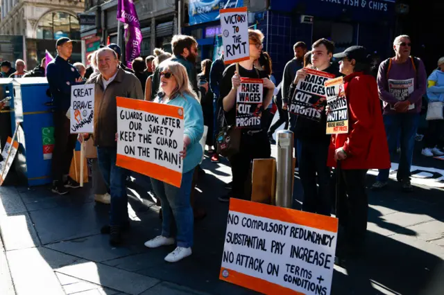 Striking workers at Glasgow's Central Station