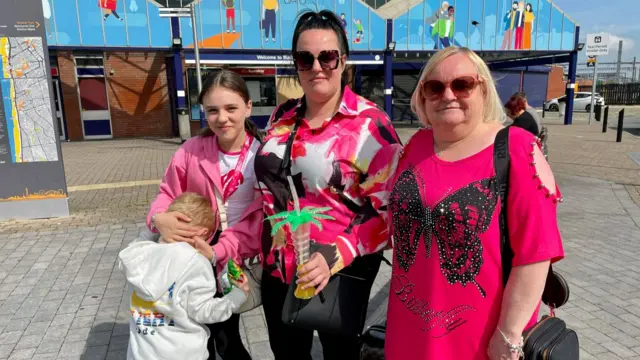 Janine and Susan Hibbert with their family