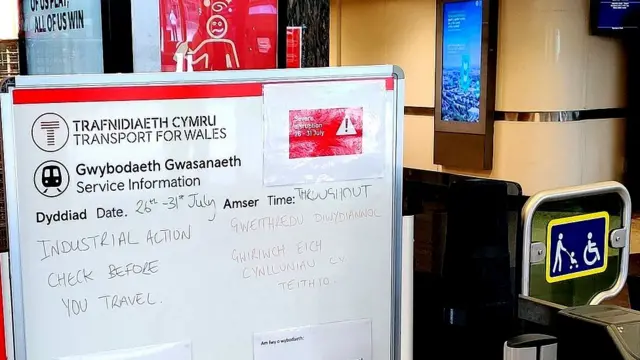 A whiteboard message at Cardiff Central train station warns passengers to expect delays until 31 July