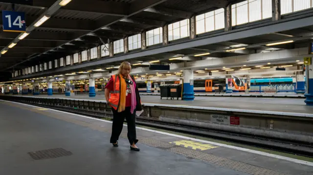 Empty platforms during rush hour at London's Euston train station