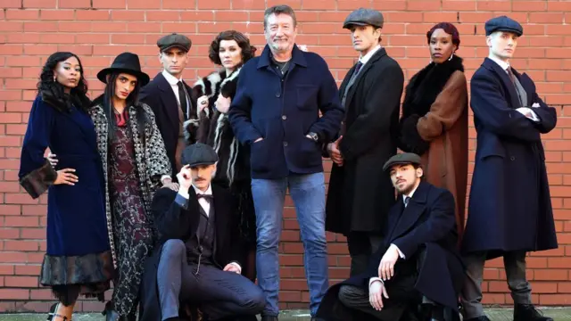 Peaky Blinders creator Steven Knight (centre) with dancers from Rambert's Peaky Blinders ballet