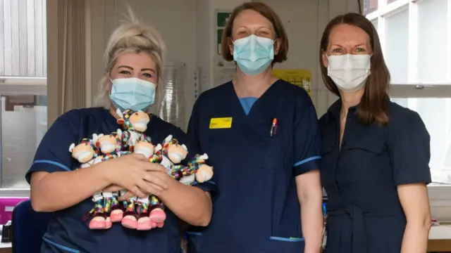 Nurses at the hospital with Perry the Bull dolls