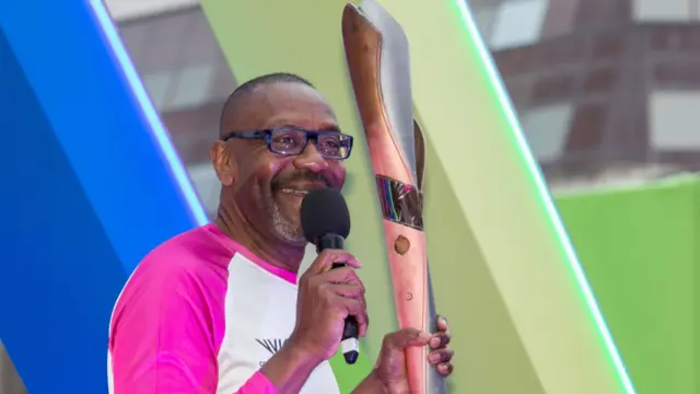 Sir Lenny with the baton