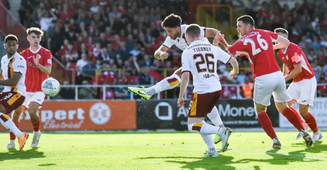 Motherwell's Ricki Lamie sends the ball into the net