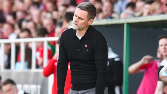 Motherwell manager Graham Alexander looks frustrated