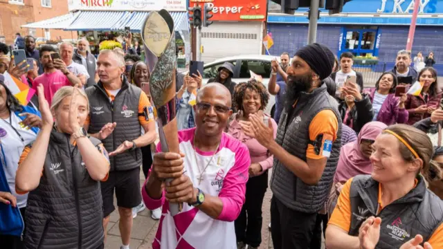 Trevor with the baton