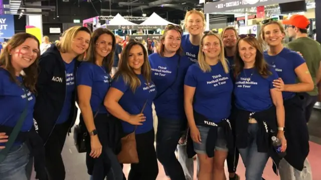 A group of women with blue t-shirts reading 'Thirsk netball nellies'