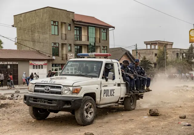 Congolese policemen intervene in Goma on 26 July, 2022 during a protest against the UN peacekeeping mission Monusco