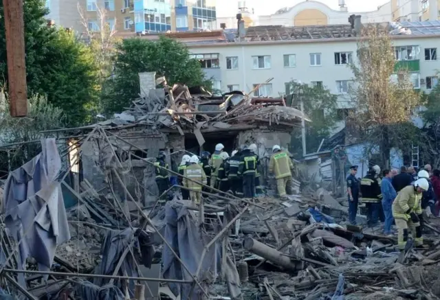 Rescuers in debris from the Belgorod explosions, 3 Jul 22