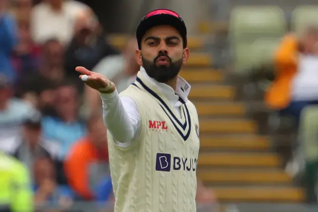 Virat Kohli blows a kiss in the direction of fans at Edgbaston