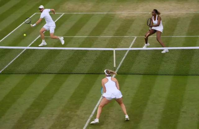 Jamie Murray and Venus Williams in action