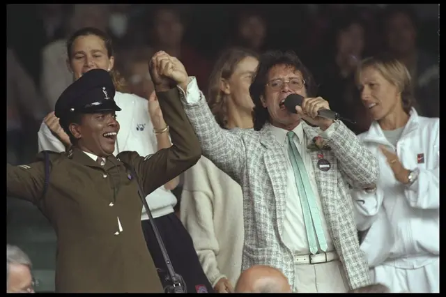 Cliff Richard singing at Wimbledon in 1996