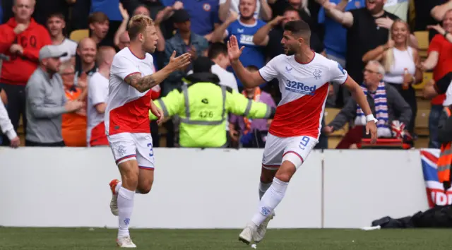 Scott Arfield came off the bench to score Rangers' equaliser before James Tavernier banged in the winner