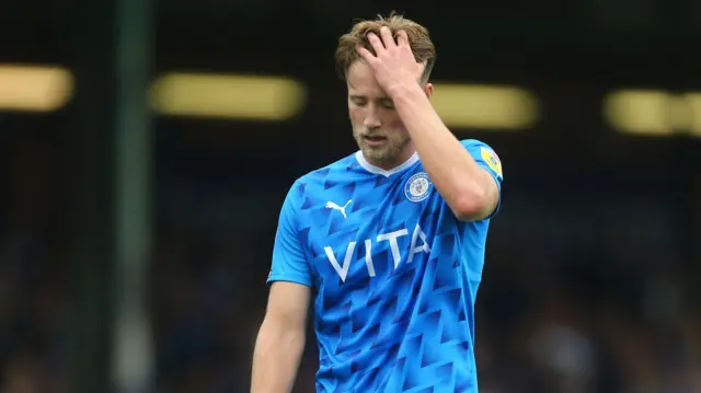 Stockport's Fraser Horsfall looks dejected