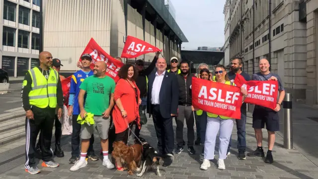 Aslef boss Mick Whelan joins the picket line outside London's Paddington station