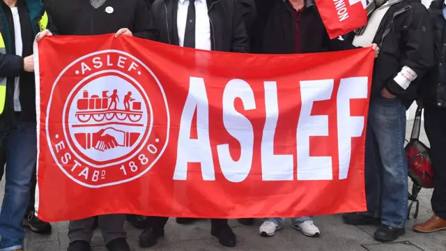 A flag on an Aslef picket line