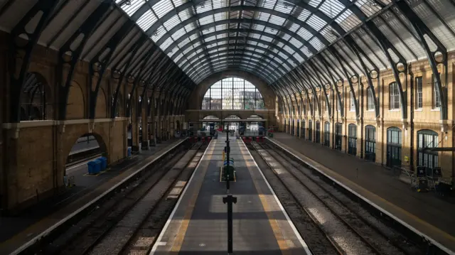 Empty tracks at London's King's Cross Station