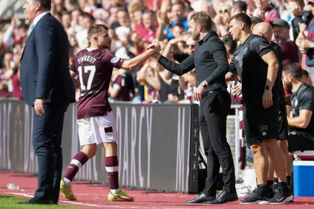 Alan Forrest and Robbie Neilson celebrate their opener