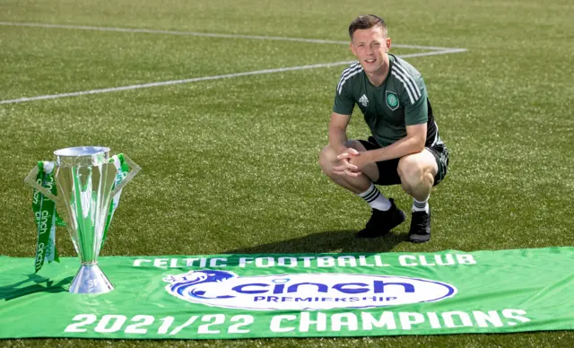 Celtic captain Callum McGregor with the Premiership flag