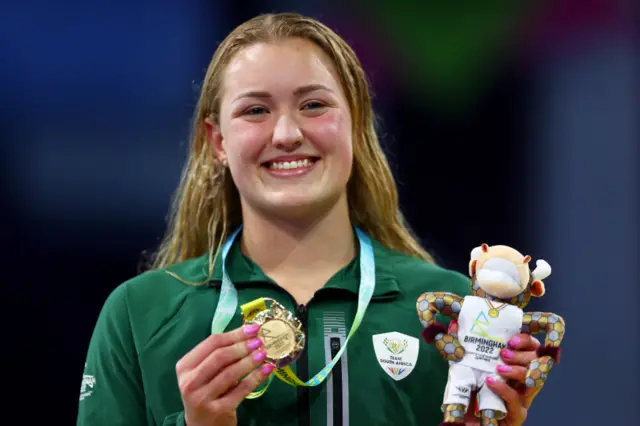 Gold medallist Lara van Niekerk of South Africa poses with her medal during the medal ceremony for the women's 50m breaststroke final on day two of the Birmingham 2022 Commonwealth Games  - 30 July 2022