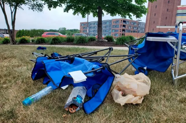 Chairs left behind after a mass shooting erupted at a Fourth of July parade in Highland Park