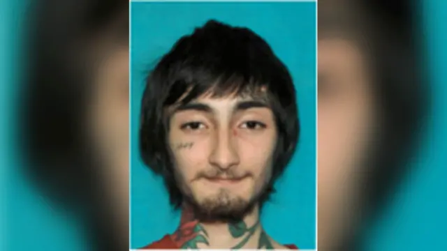 A photo of suspect Robert E Crimo III released by police