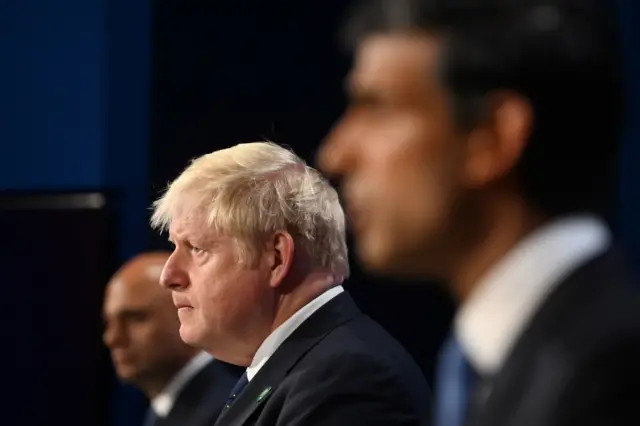 File photo dated 07/09/21 of (left to right) Health Secretary Sajid Javid, Prime Minister Boris Johnson and Chancellor of the Exchequer Rishi Sunak, during a media briefing in Downing Street, London