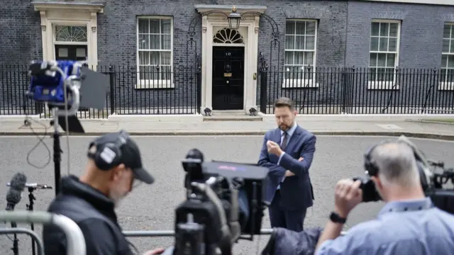 Members of the press outside Downing Street