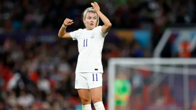 A photo of Lauren Hemp playing for England