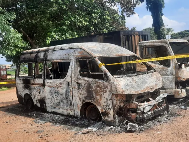 A burnt vehicle outside Kuje prison