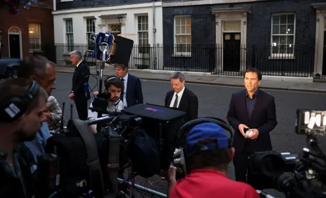 TV correspondents report outside 10 Downing Street,